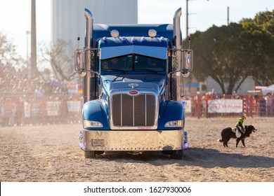 Homestead, Florida/USA - January 26, 2020: 71st Annual Homestead Championship Rodeo, unique western sporting event. Blue Peterbilt truck on a field. Peterbilt Motors Company at Homestead Rodeo.