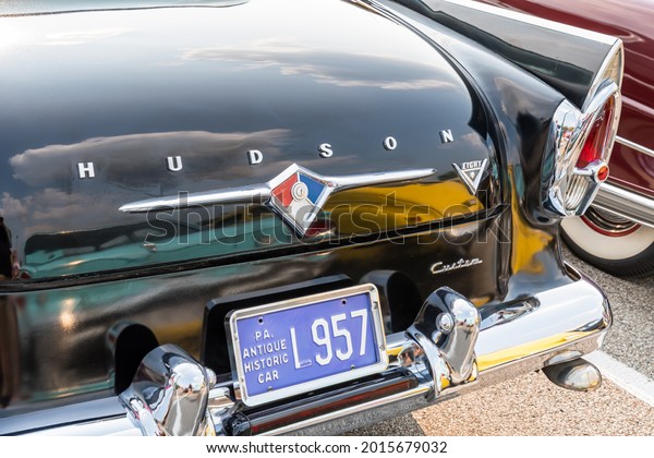 Homestead, Pennsylvania, USA July 21, 2021 The\
Pennsylvania license plate and trunk of a 1957 Hudson at a summer\
vintage car show