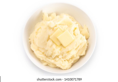 Homestyle Mashed Potatoes with Butter Isolated on a Wooden Table