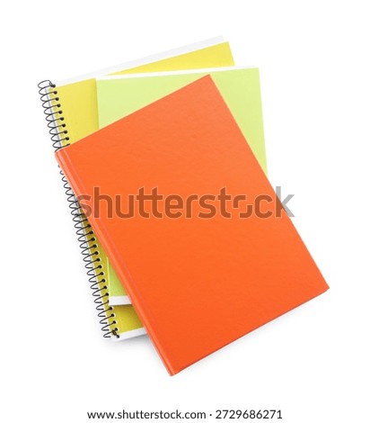 Homework. Stack of colorful notebooks isolated on white, top view