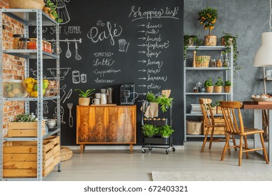 Homey Kitchen With Chalkboard Wall In The Loft