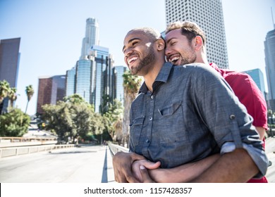 Homosexual Couple At A Romantic Date Outdoors - Multi-ethnic Gay Couple In Love Flirting And Having Fun