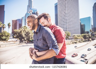 Homosexual Couple At A Romantic Date Outdoors - Multi-ethnic Gay Couple In Love Flirting And Having Fun