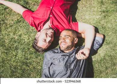 Homosexual Couple At A Romantic Date Outdoors - Gay Couple In Love Flirting And Having Fun