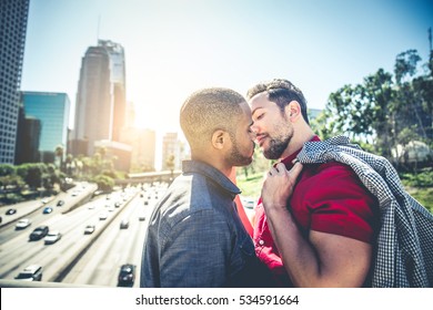 Homosexual Couple At A Romantic Date Outdoors - Multi-ethnic Gay Couple In Love Flirting And Having Fun