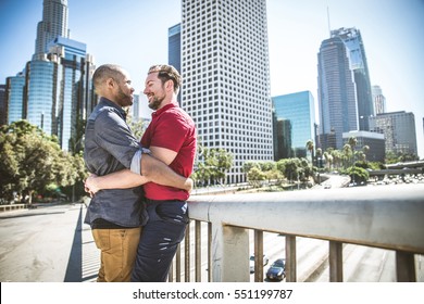 Homosexual Couple At A Romantic Date Outdoors - Multi-ethnic Gay Couple In Love Flirting And Having Fun