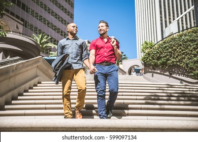 Homosexual Couple At A Romantic Date Outdoors - Multi-ethnic Gay Couple In Love Flirting And Having Fun