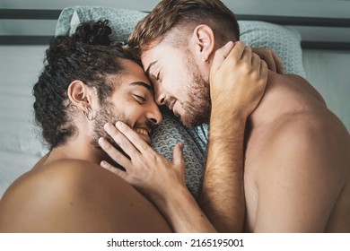 Homosexual Male Couple Caressing Shirtless In The Bed - LGBT Gay Lifestyle Concept