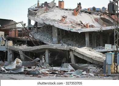 Homs, Syria, September 2013 Destroyed Building Located Near The Road Between Homs And Damascus. The Building Destroyed In The Fighting Between The Rebels Of The Syrian National Army