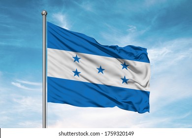 Honduras National Flag Cloth Fabric Waving On Beautiful Sky.