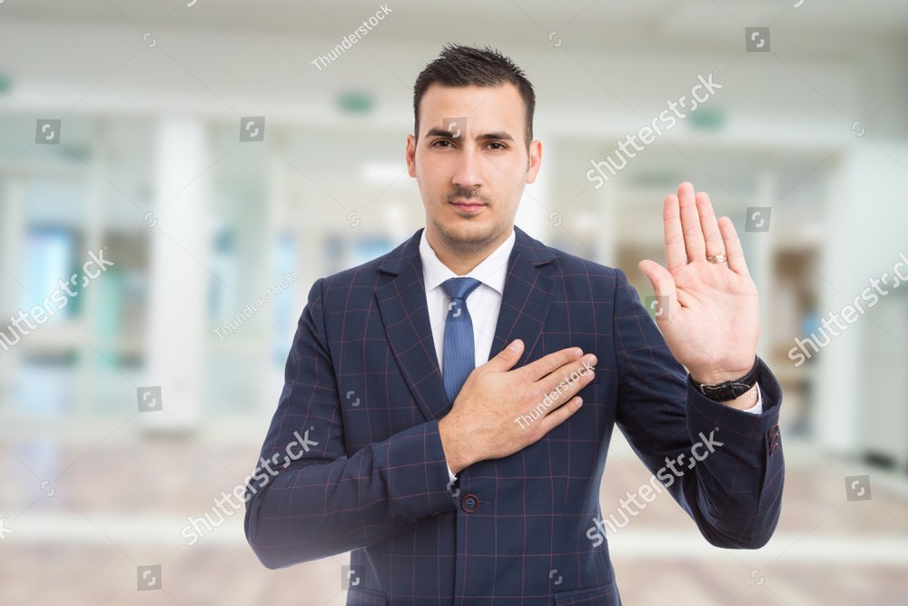 Honest trustworthy real estate agent making oath swear vow gesture on ...