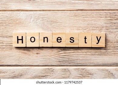 honesty word written on wood block. honesty text on table, concept.