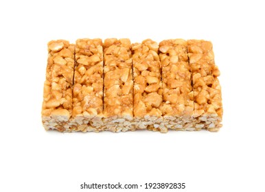 Honey bars with peanuts, sesame and sunflower seeds isolated