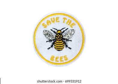 A Honey Bee Embroidered On A Badge