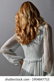 Honey Blonde Hair Model Wearing Delicate Tulle Dress. Curly Hair Close Up.  