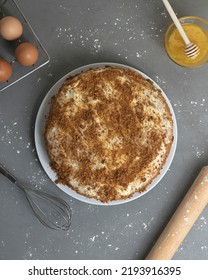 Honey Cake Dessert. Tools And Ingredients For Cooking Are Around. Gray Background. Vertical Frame