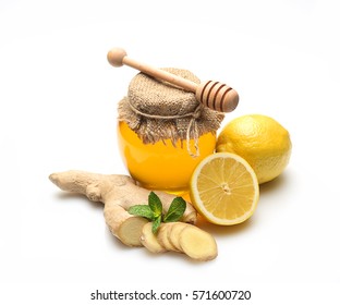 Honey, Ginger, Lemon And Spices On A White Background