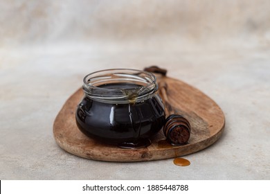 Honey in jar with honey dipper - Powered by Shutterstock