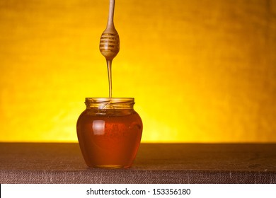 Honey Jar And Dipper, Studio Shot  