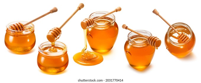 Honey jars and wooden dippers set isolated on white background. Package design element with clipping path  - Powered by Shutterstock