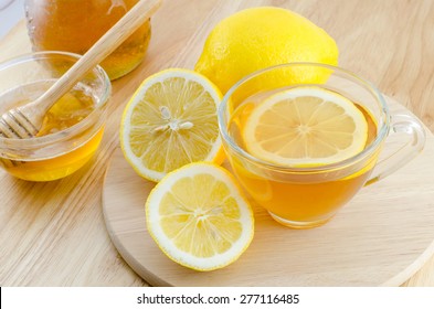 Honey Lemon Tea On Wooden Table