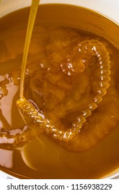 Honey Liquid Background Macro Closeup. Helth Food