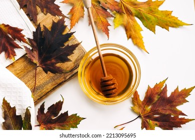 Honey Or Maple Syrup In A Bowl. High Quality Photo