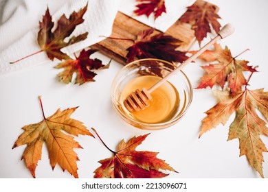 Honey Or Maple Syrup In A Bowl. High Quality Photo