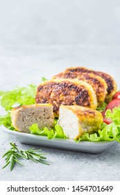 Honey Mustard Chicken Rissoles, Salad Leaves, Cherry Tomatoes. Selective Focus, Space For Text.