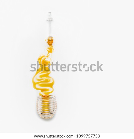 Similar – Image, Stock Photo Honey poured from glass with honey spoon