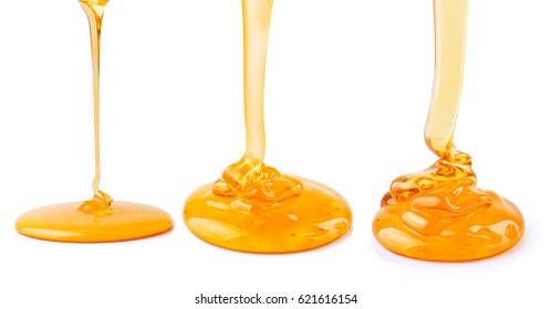 Honey pouring isolated on white background.
Ideal for packaging.