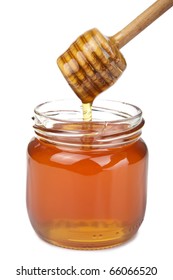 Honey Pouring In Jar Isolated