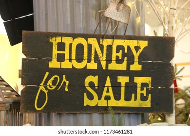 A honey for sale sign