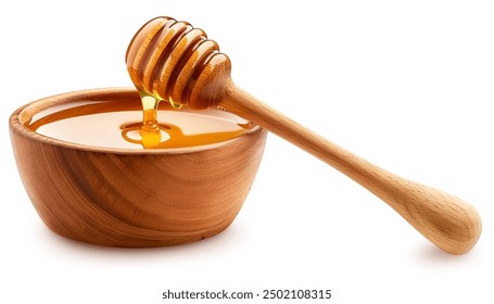 Honey with wooden honey dipper in wooden bowl isolated on white background
