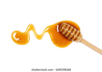 Honey and wooden dipper isolated on white background, top view