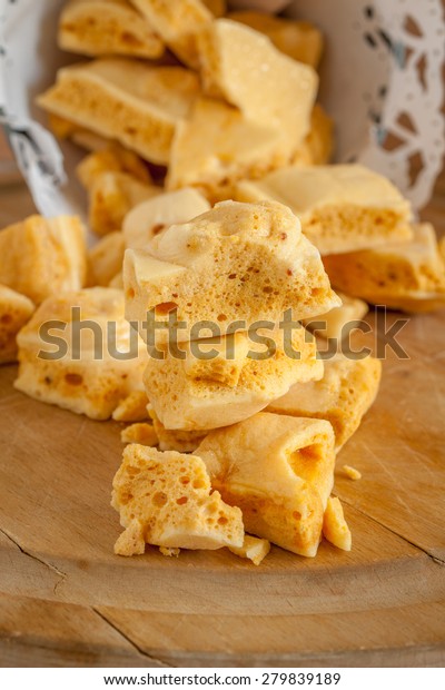 Honeycomb or cinder toffee\
hokey pokey sea foam known by many names and enjoyed around the\
world 