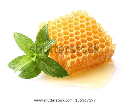 Honeycomb with mint in closeup