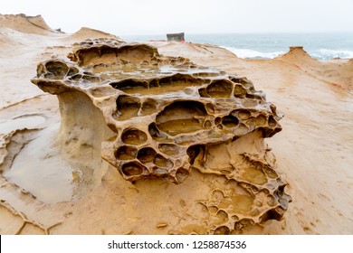 Honeycomb Weathering Rock At Yehliu Geopark In Taiwan. Honeycombed Rocks Refer To The Rocks That Are Covered With Holes Of Different Sizes And Appear Like The Honeycombs As A Result. 