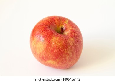 Honeycrisp Apple Close Up. White Background.