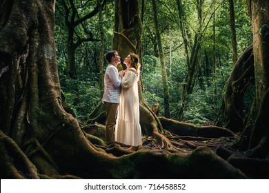 Honeymoon Couple At Balinese Botanical Garden In Jungle. Ubud, Bali