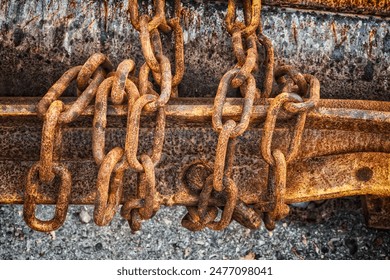 Honfleur, France - Close-up of rusted chains wrapped around a metal beam. - Powered by Shutterstock