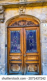 HONFLUER, FRANCE - OCTOBER 8, 2021 Law Office Lawyers Judicial Scales Wooden Door Inner Harbor Honfluer France.  