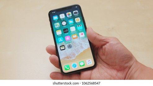 Hong Kong, Hong Kong, 01 March 2018:- Switching on IphoneX  - Shutterstock ID 1062568547