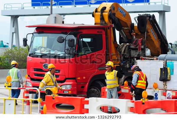 Hong Kong, Hong
kong. 02/08/2012 Construction workers and equipment at construction
in Hong Kong. Editorial.