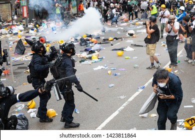 Hong Kong 12th June 2019: Anti Extradition Bill Protest.  Riot Police Firing Pepper Spray  The Air Is Full Of Tear Gas During Clashes With Protesters Outside  Central Government Office In Hong Kong