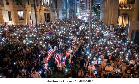 Hong Kong 14 Oct 2019: Hong Kong protesters fill Chater Garden, wave American flags and spill onto nearby roads in Central, calling for United States to pass Hong Kong Human Rights and Democracy Act