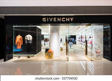 HONG KONG - 22 JAN, 2015: Givenchy Fashion Boutique Display Window With Mannequin In Haute Couture Clothes And Luxury Accessories For Exclusive Shopping