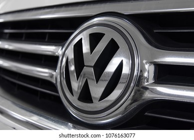 Hong Kong, Hong Kong - 25 April 2018: Close-up of Volkswagen VW logo badge and car grill on white VW car.