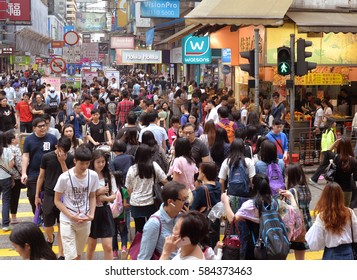 Hong Kong - APR 23, 2016: Crowd Of People At The Street In Hong Kong.