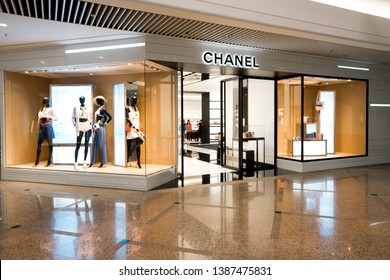 Hong Kong - April 13 2019: Chanel Luxury High Fashion House Goods Store In Shopping Center. Brand Logo And View Inside The Store